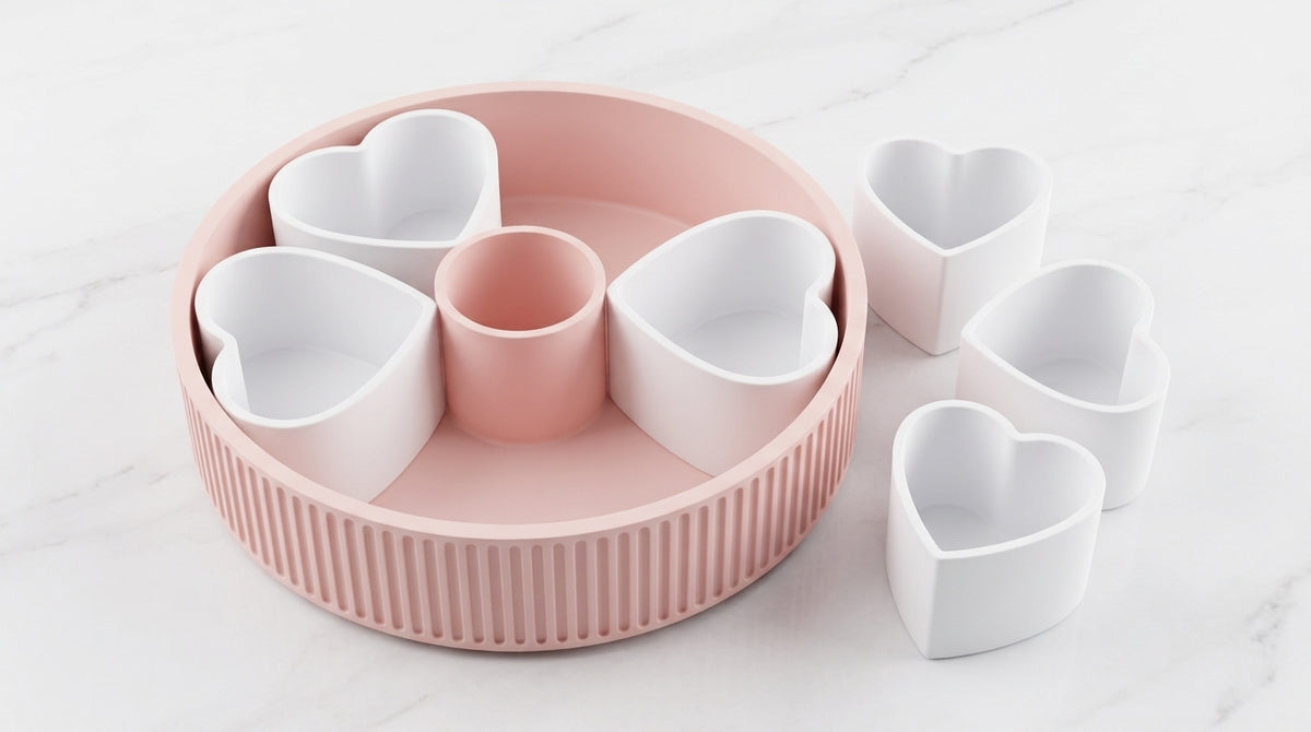 Pink heart-shaped snack platter with removable serving bowls