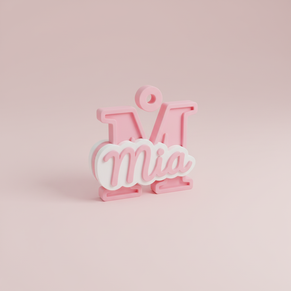 Pink personalised initial and name keyring featuring the letter M and the name Mia